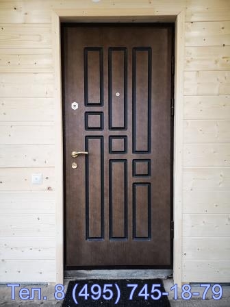 Входная дверь в дом из бруса утепленная от производителя. Отделка МДФ